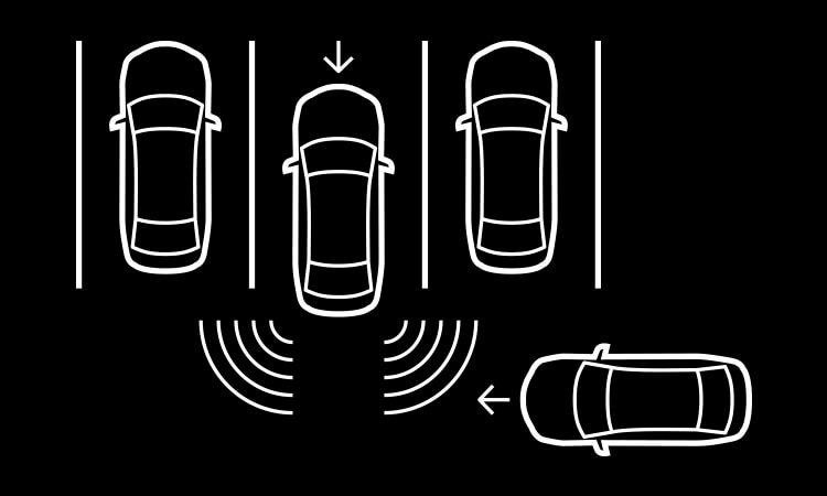 Illustration 3 Mazdas, parked. The center one backs out and senses oncoming, unseen traffic from beyond the surrounding parked vehicles.