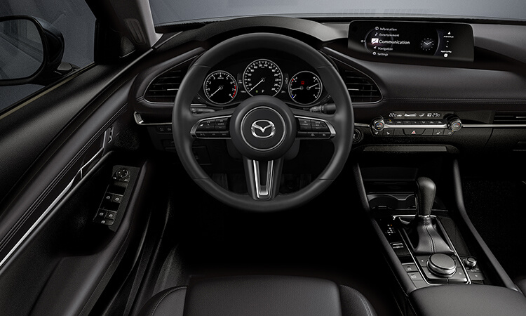 Driver’s side view inside Mazda3 Sport cockpit.